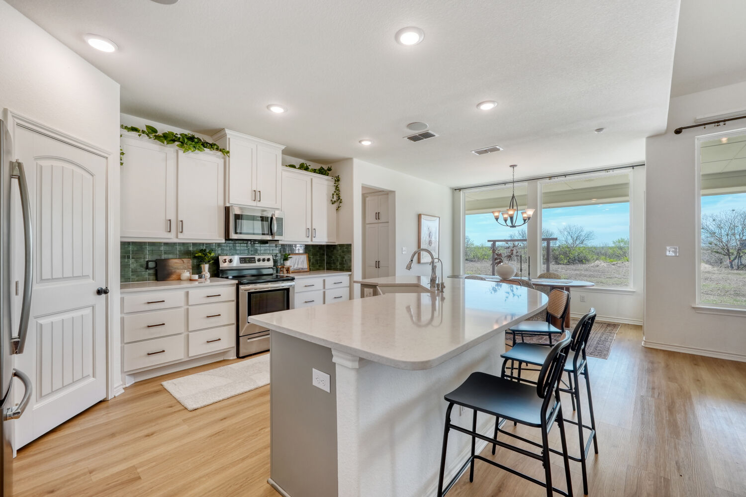 1642 Scull Road San Marcos, TX 78666 - Photo 5 of 31 Gourmet kitchen overlooking the living and dining spaces.