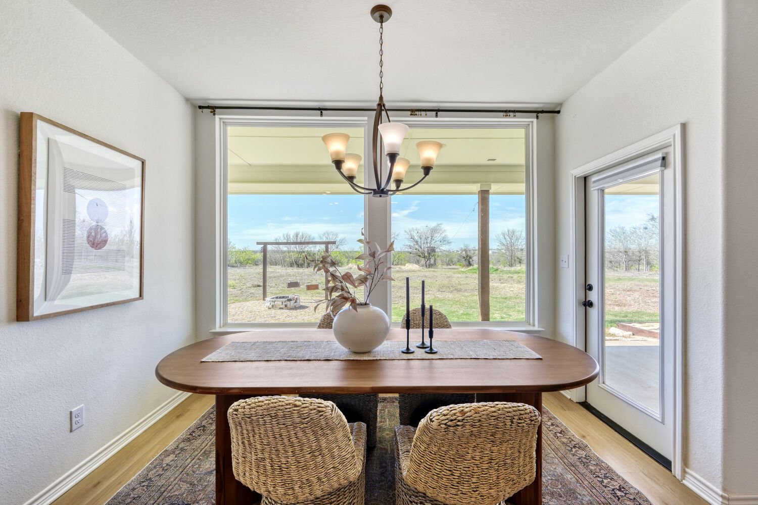 1642 Scull Road San Marcos, TX 78666 - Photo 8 of 31 Dining area framed by expansive landscape views.