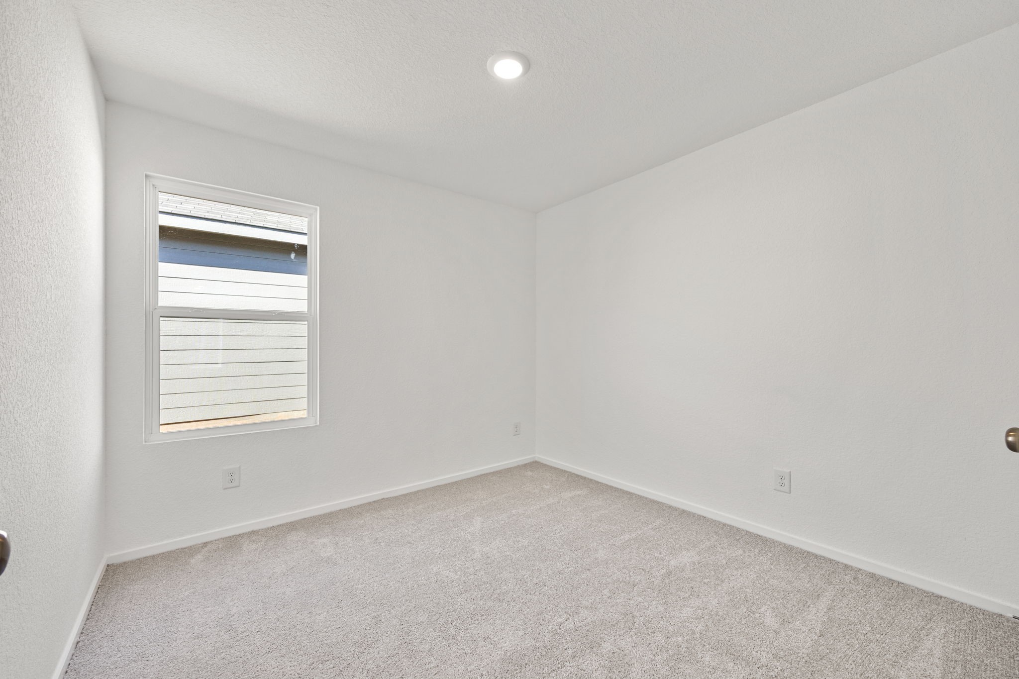 31433 Moore Road Magnolia, TX 77354 - Photo 15 of 25 an empty room with a window