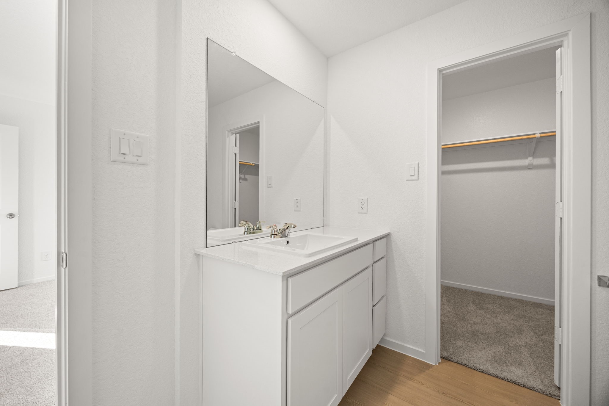 31433 Moore Road Magnolia, TX 77354 - Photo 20 of 25 a bathroom with a sink and a mirror