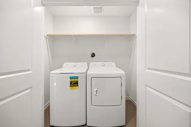 a swimming pool with an outdoor seating and house