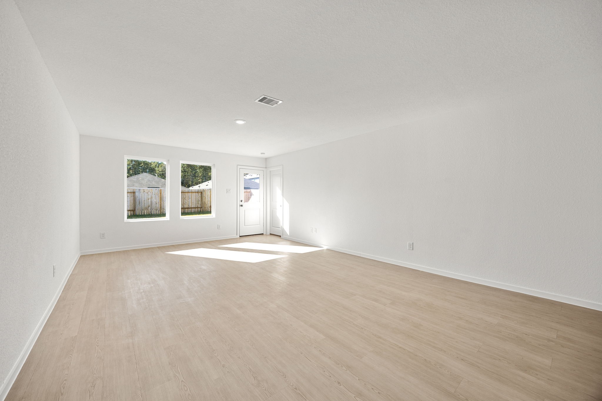 31433 Moore Road Magnolia, TX 77354 - Photo 6 of 25 an empty room with a window