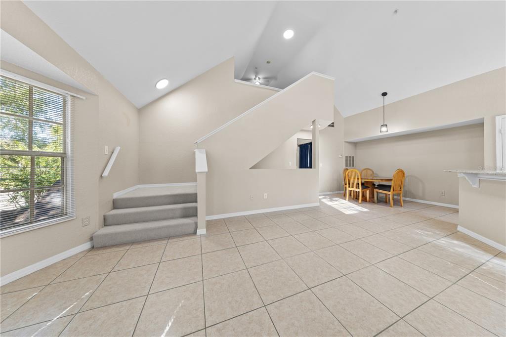 6340 Raleigh Street, Unit 1011 Orlando, FL 32835 - Photo 13 of 68 a view of an empty room with a window