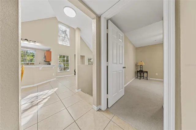 a bathroom with a granite countertop sink a bathtub and a shower