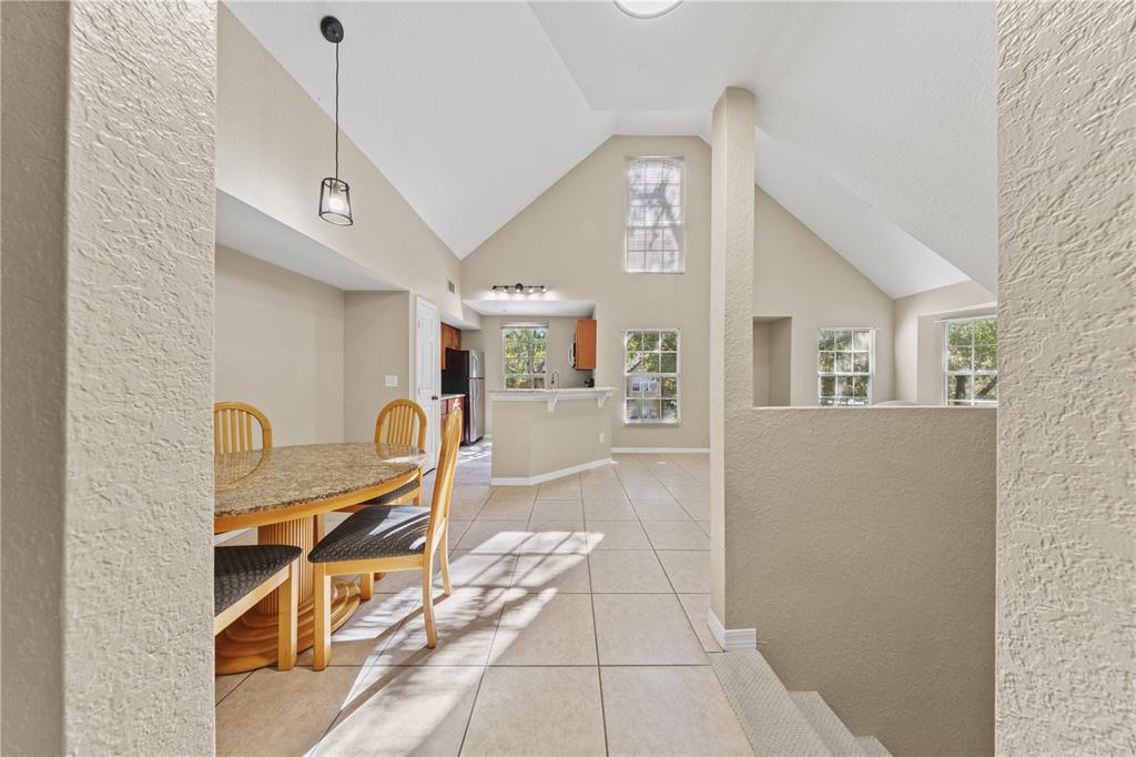 6340 Raleigh Street, Unit 1011 Orlando, FL 32835 - Photo 29 of 68 a view of a hallway with seating area