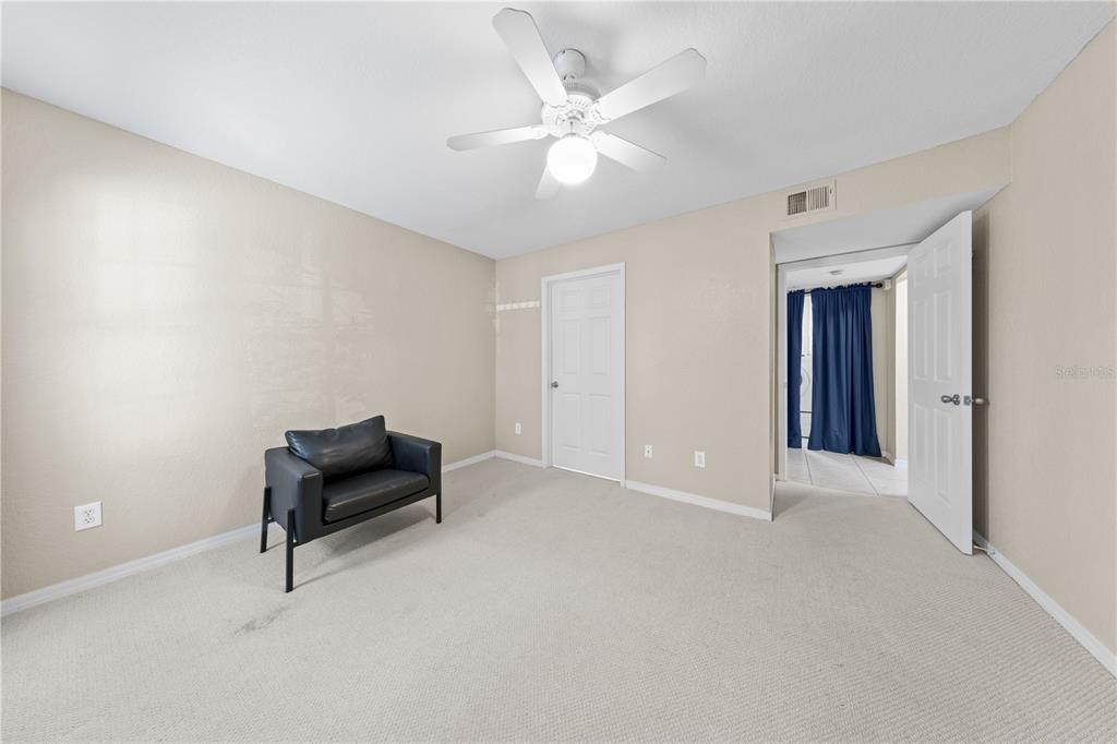 6340 Raleigh Street, Unit 1011 Orlando, FL 32835 - Photo 42 of 68 a view of workspace with couch