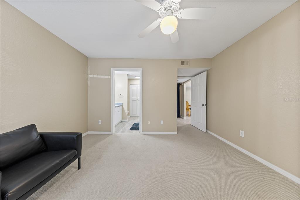 6340 Raleigh Street, Unit 1011 Orlando, FL 32835 - Photo 44 of 68 a view of livingroom with furniture