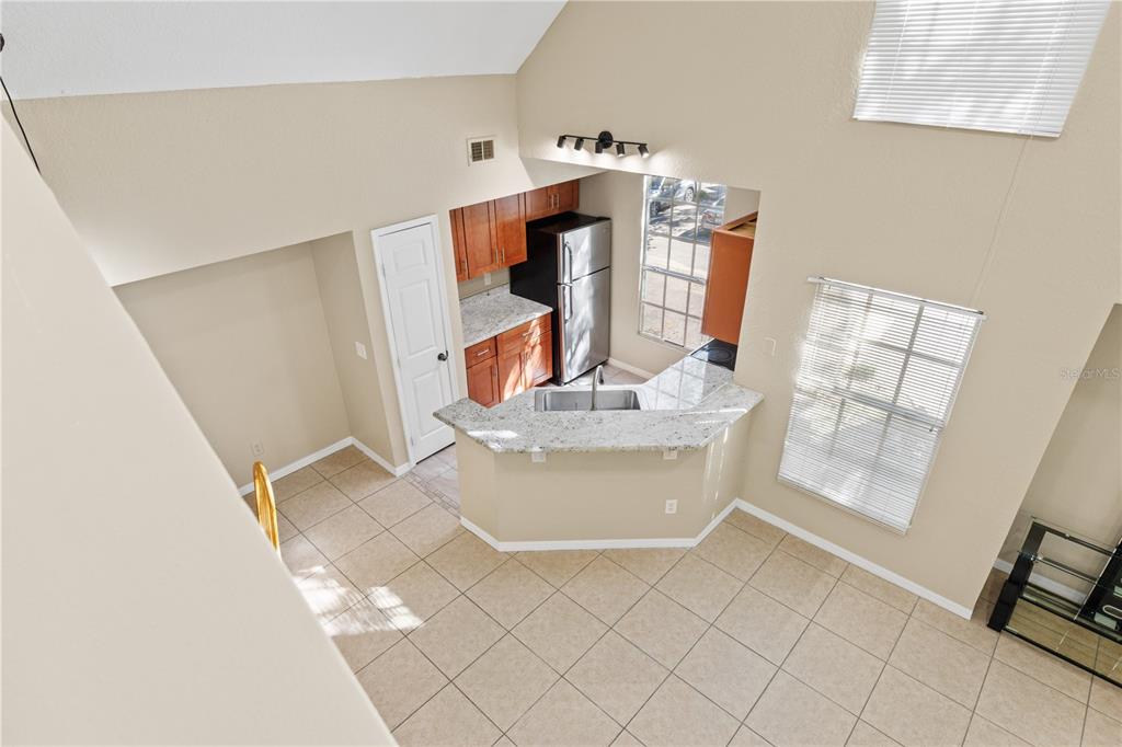 6340 Raleigh Street, Unit 1011 Orlando, FL 32835 - Photo 55 of 68 a view of living room with furniture and wooden floor