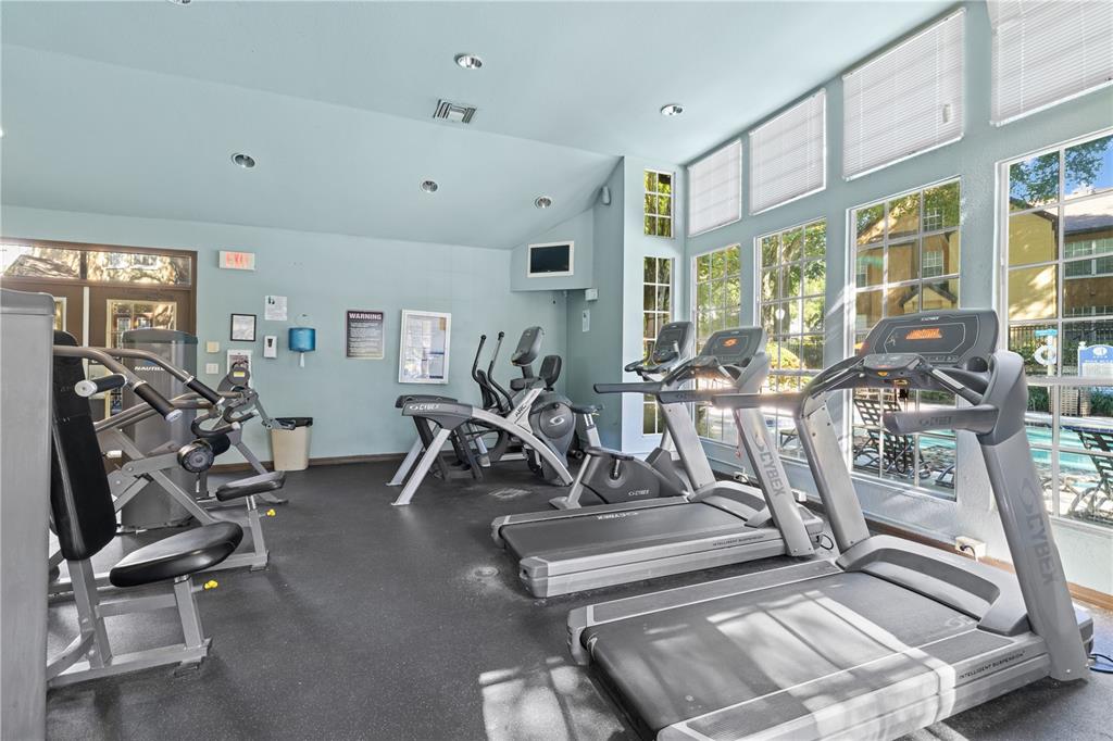 6340 Raleigh Street, Unit 1011 Orlando, FL 32835 - Photo 63 of 68 a view of a room with gym equipment