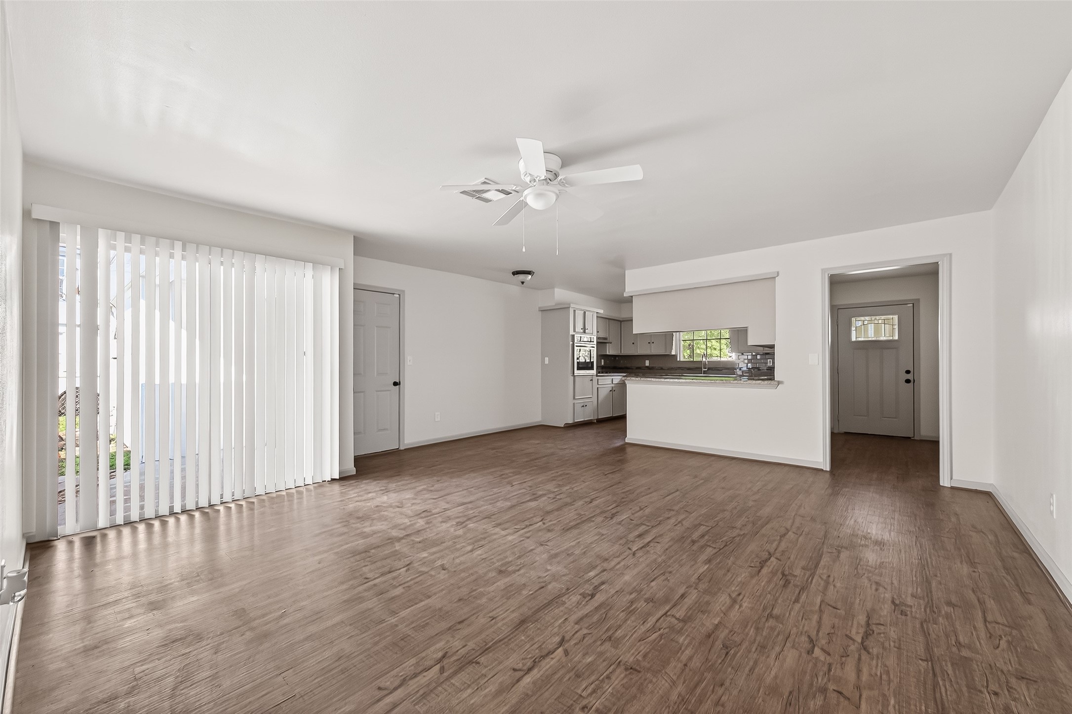 10503 Ladino Road Cypress, TX 77429 - Photo 5 of 21 Fresh interior paint and durable luxury vinyl plank flooring throughout for easy maintenance.