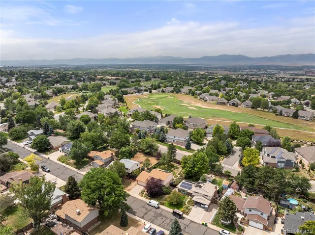 an aerial view of a city with lots of residential buildings