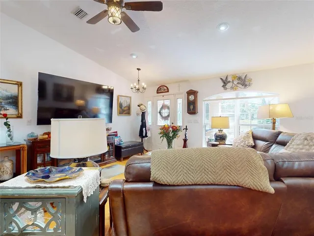 a kitchen with a sink a counter top space and cabinets