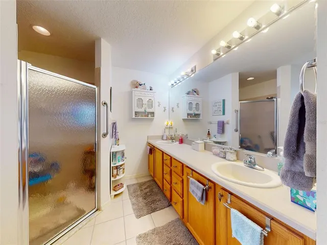 an aerial view of house with a swimming pool yard and outdoor seating