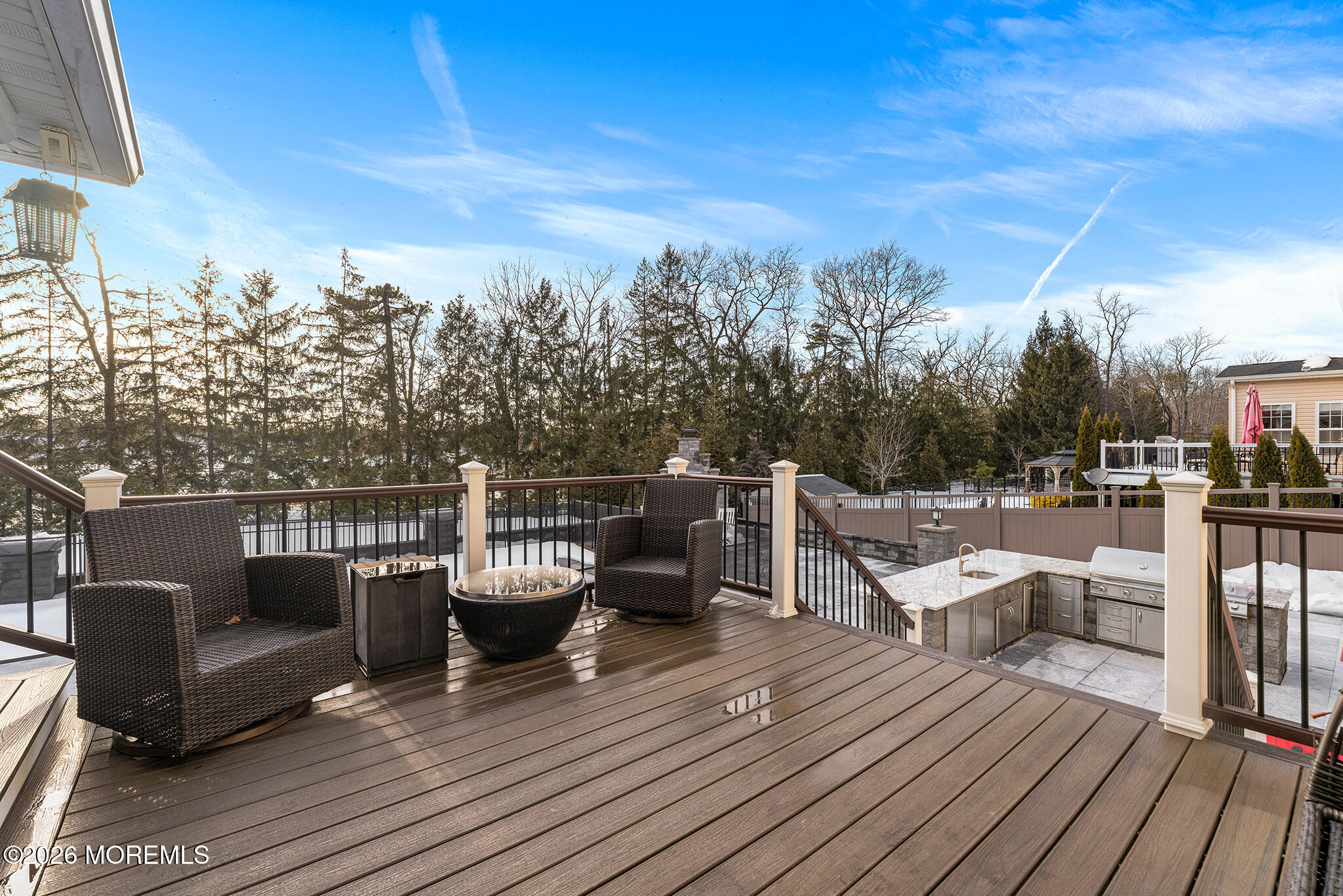 8 Cindy Court Howell, NJ 07731 - Photo 15 of 63 a view of a roof deck with couches and wooden floor