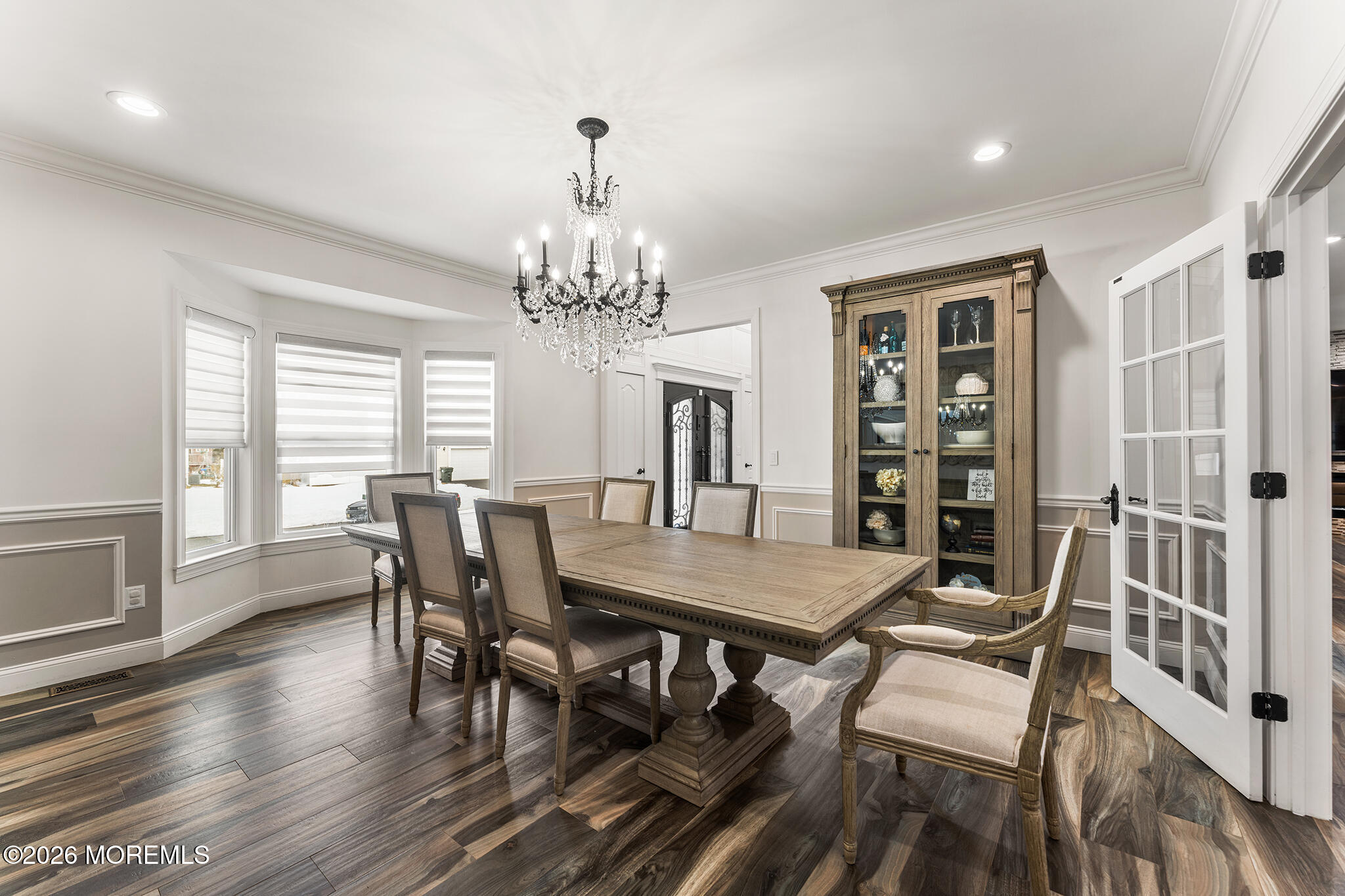 8 Cindy Court Howell, NJ 07731 - Photo 23 of 63 a view of a dining room with furniture window and wooden floor