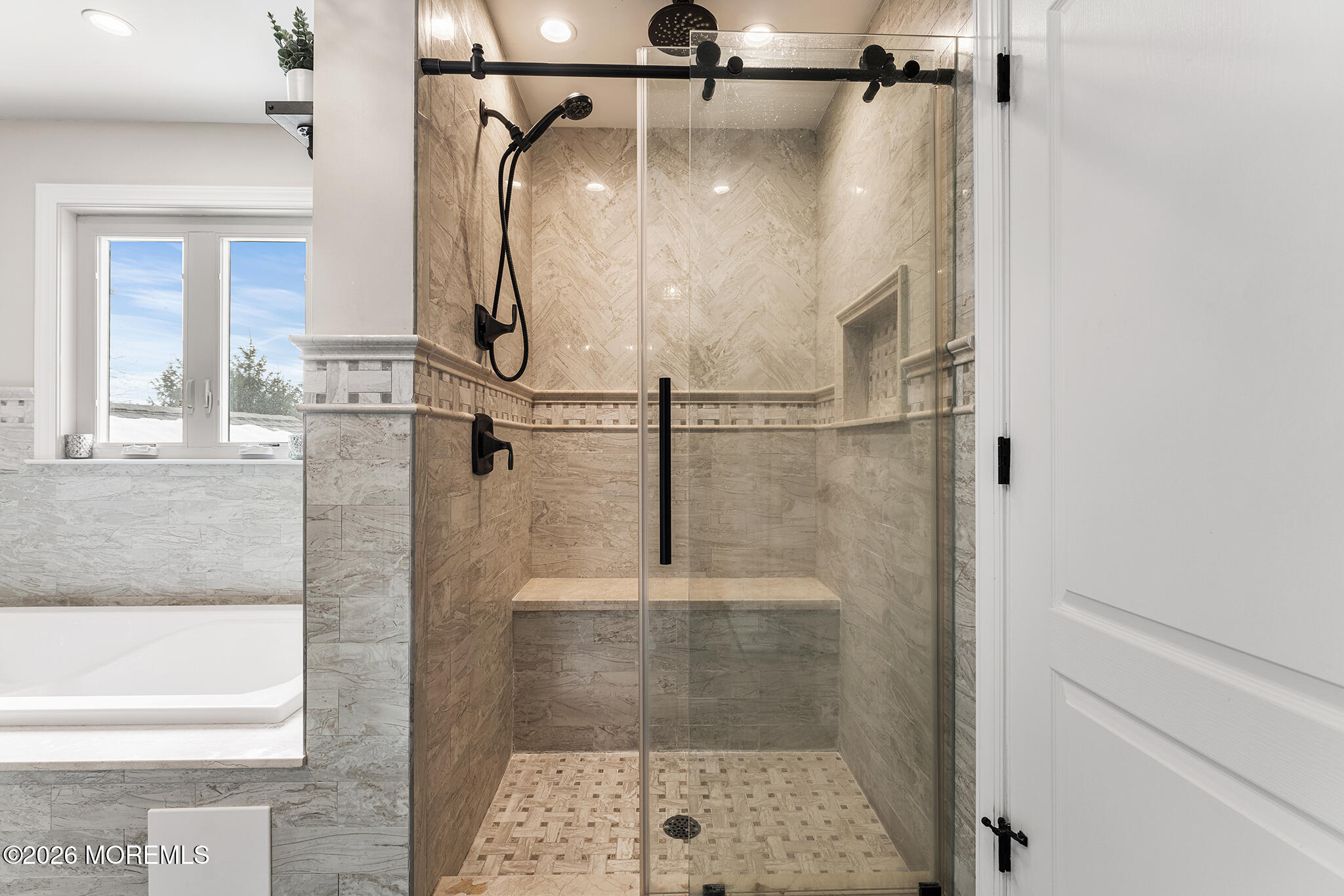 8 Cindy Court Howell, NJ 07731 - Photo 52 of 63 a bathroom with a glass shower door