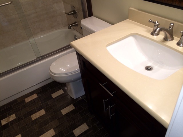 305 Shoreline Road, Unit 305 Lake Barrington, IL 60010 - Photo 14 of 23 a bathroom with a sink and a toilet