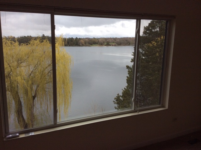 305 Shoreline Road, Unit 305 Lake Barrington, IL 60010 - Photo 16 of 23 a view of a glass door with a lake view