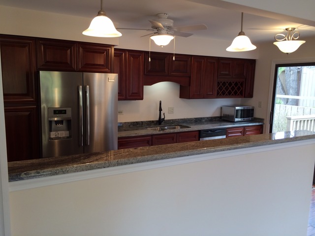305 Shoreline Road, Unit 305 Lake Barrington, IL 60010 - Photo 10 of 23 a kitchen with stainless steel appliances granite countertop a refrigerator and a sink