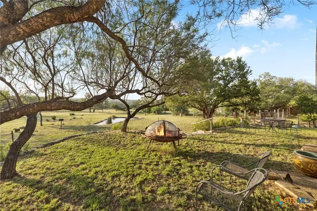 a view of a house with entertaining space