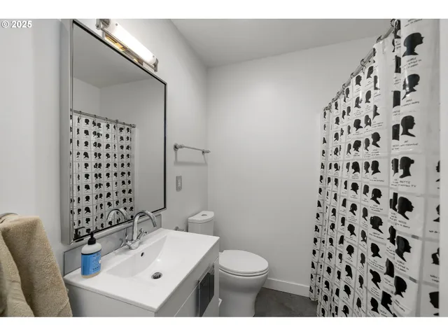 a view of a chairs and table on the wooden deck