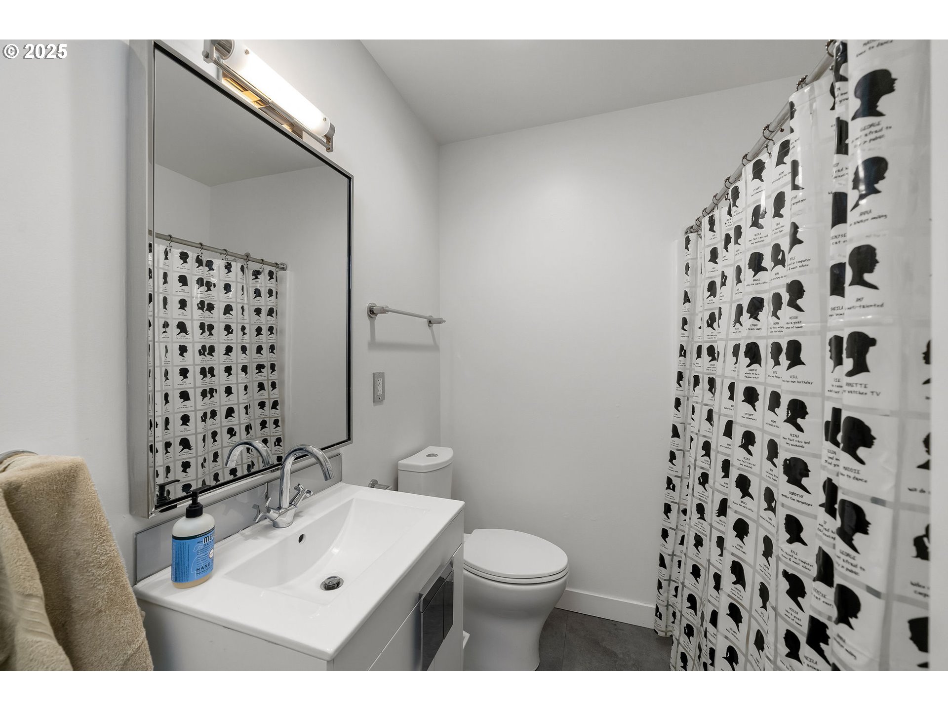 900 Northeast 81st Avenue, Unit 111 Portland, OR 97213 - Photo 17 of 25 a bathroom with a sink a toilet and shower