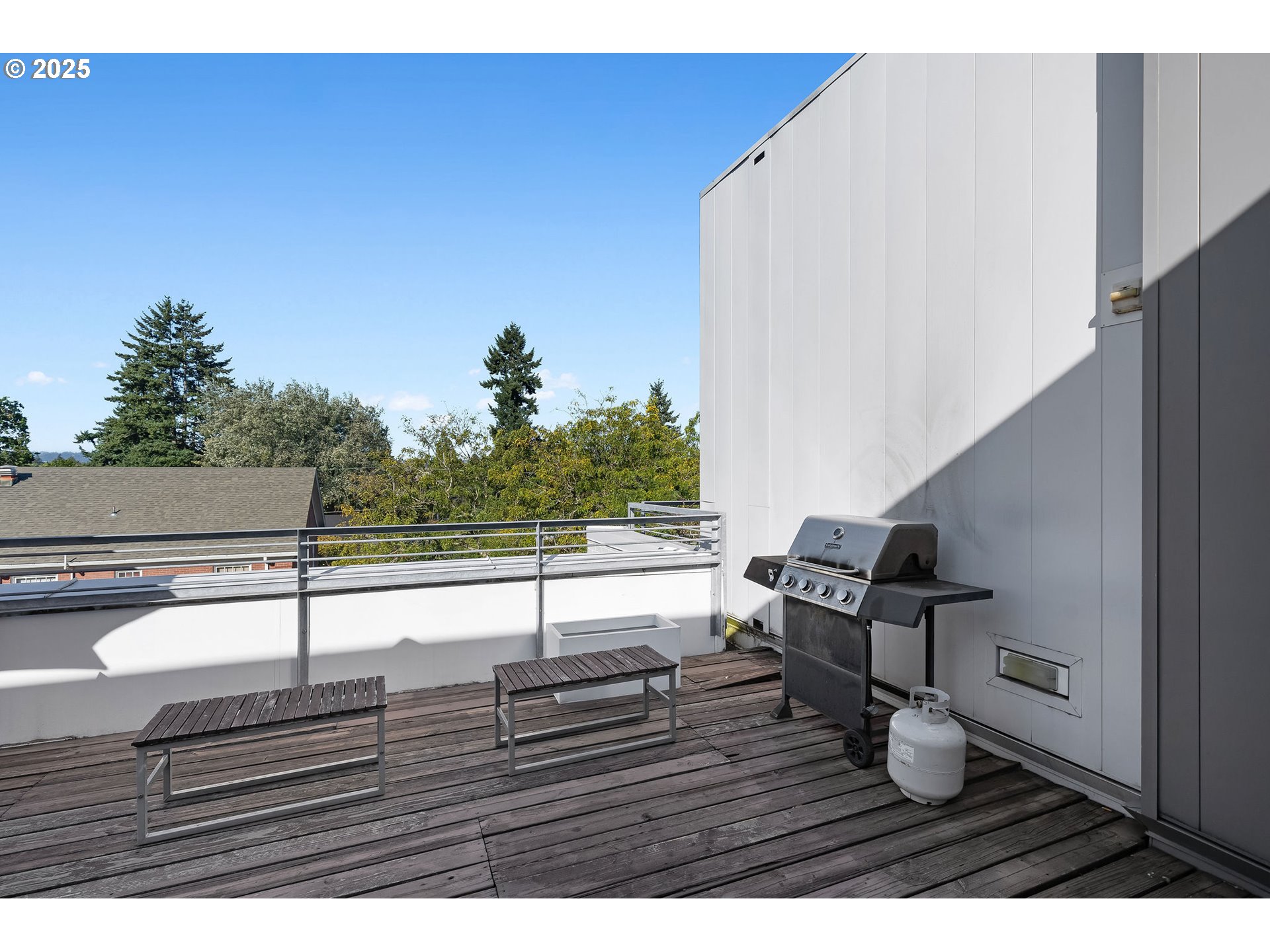 900 Northeast 81st Avenue, Unit 111 Portland, OR 97213 - Photo 19 of 25 a view of a terrace with wooden floor