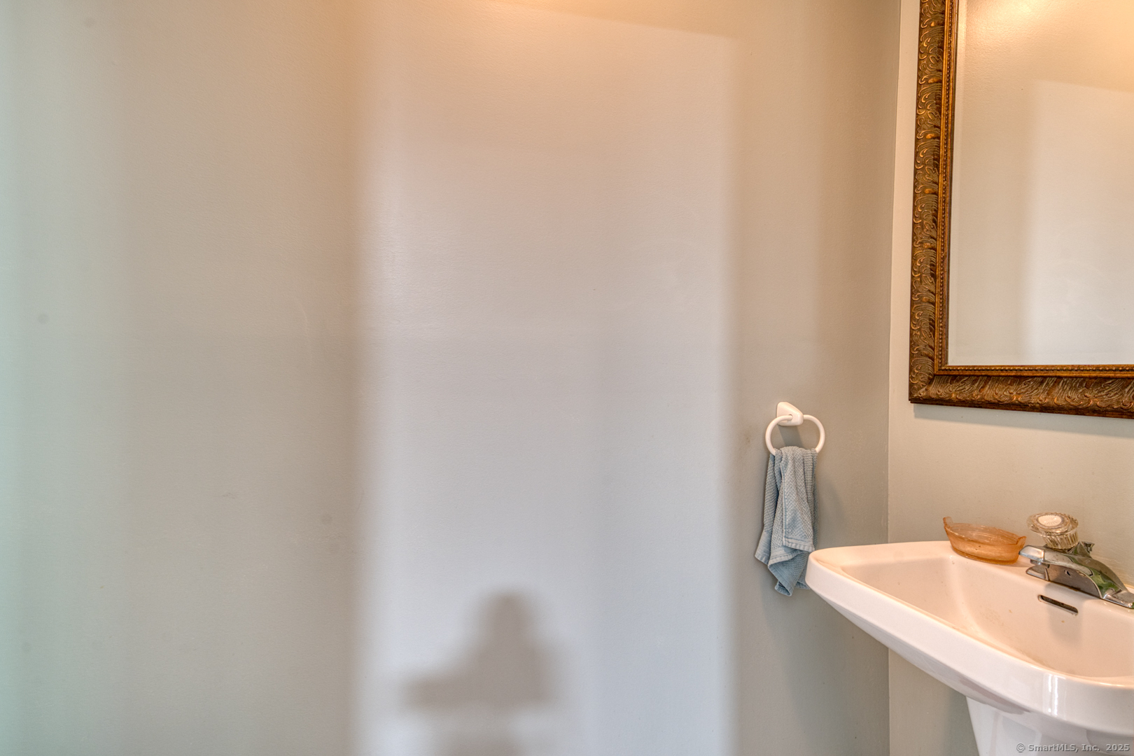 287 South Bear Hill Road Chaplin, CT 06235 - Photo 18 of 40 a bathroom with a sink and a mirror