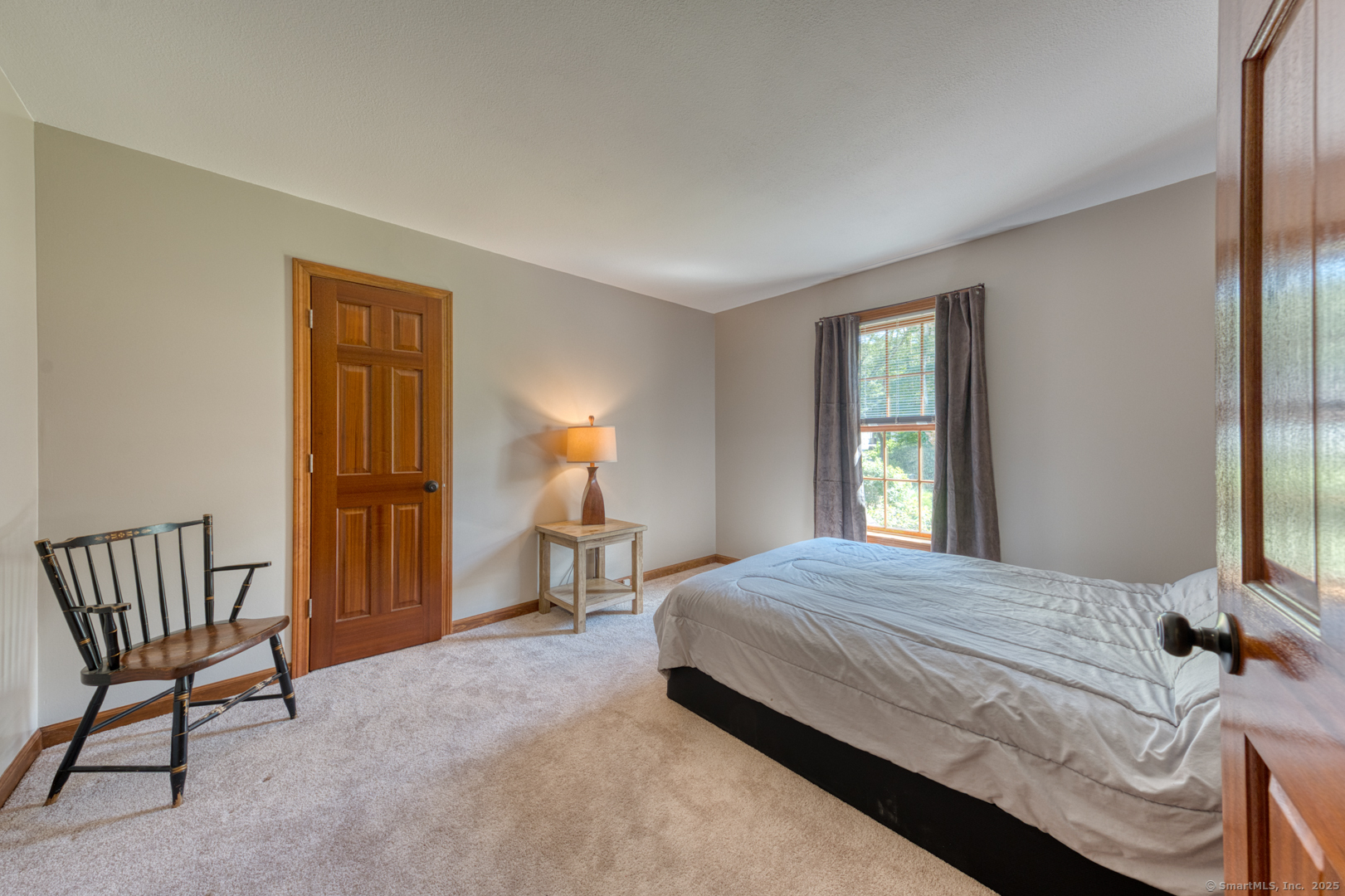 287 South Bear Hill Road Chaplin, CT 06235 - Photo 25 of 40 a bedroom with a bed chair and window