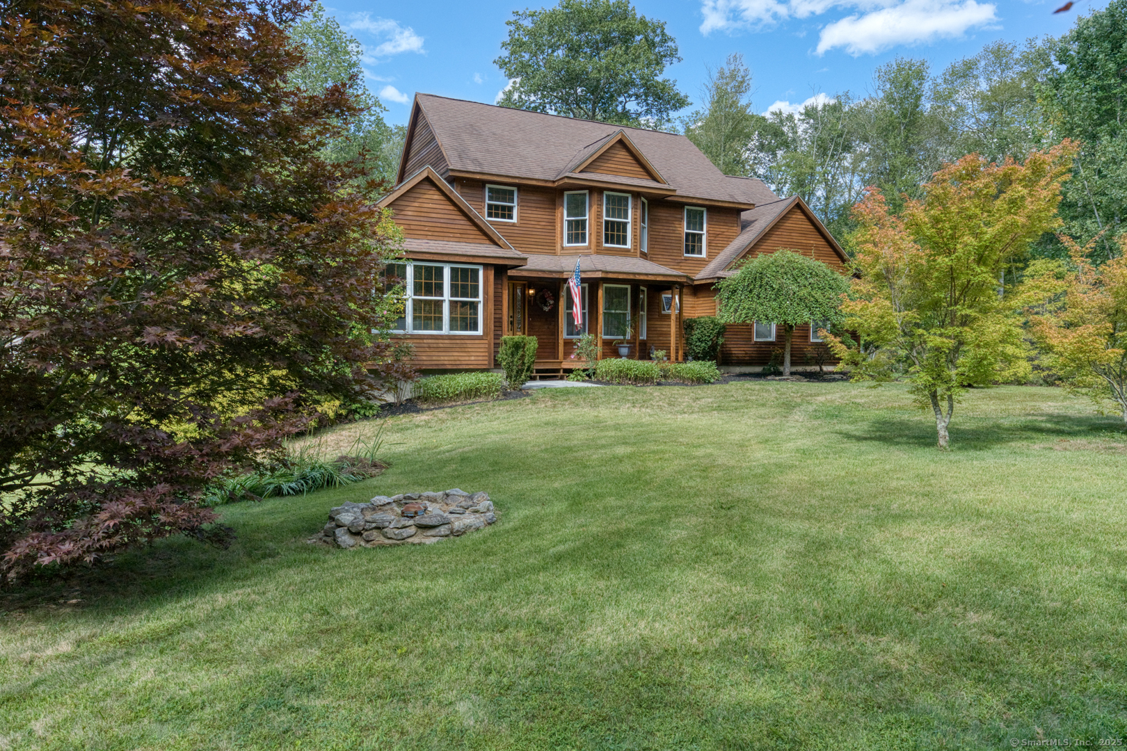 287 South Bear Hill Road Chaplin, CT 06235 - Photo 3 of 40 a front view of a house with a garden