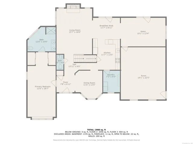 an aerial view of a house with a yard and trees