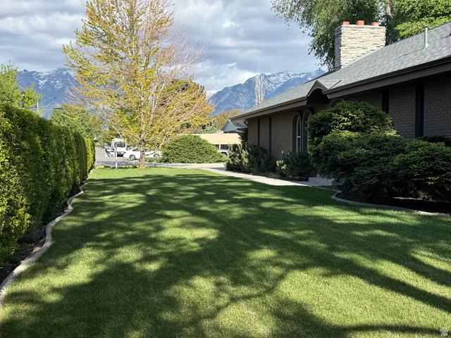 362 East 9150th Street South Sandy, UT 84070 - Photo 14 of 41 Expansive front yard featuring a manicured lawn and mature tree