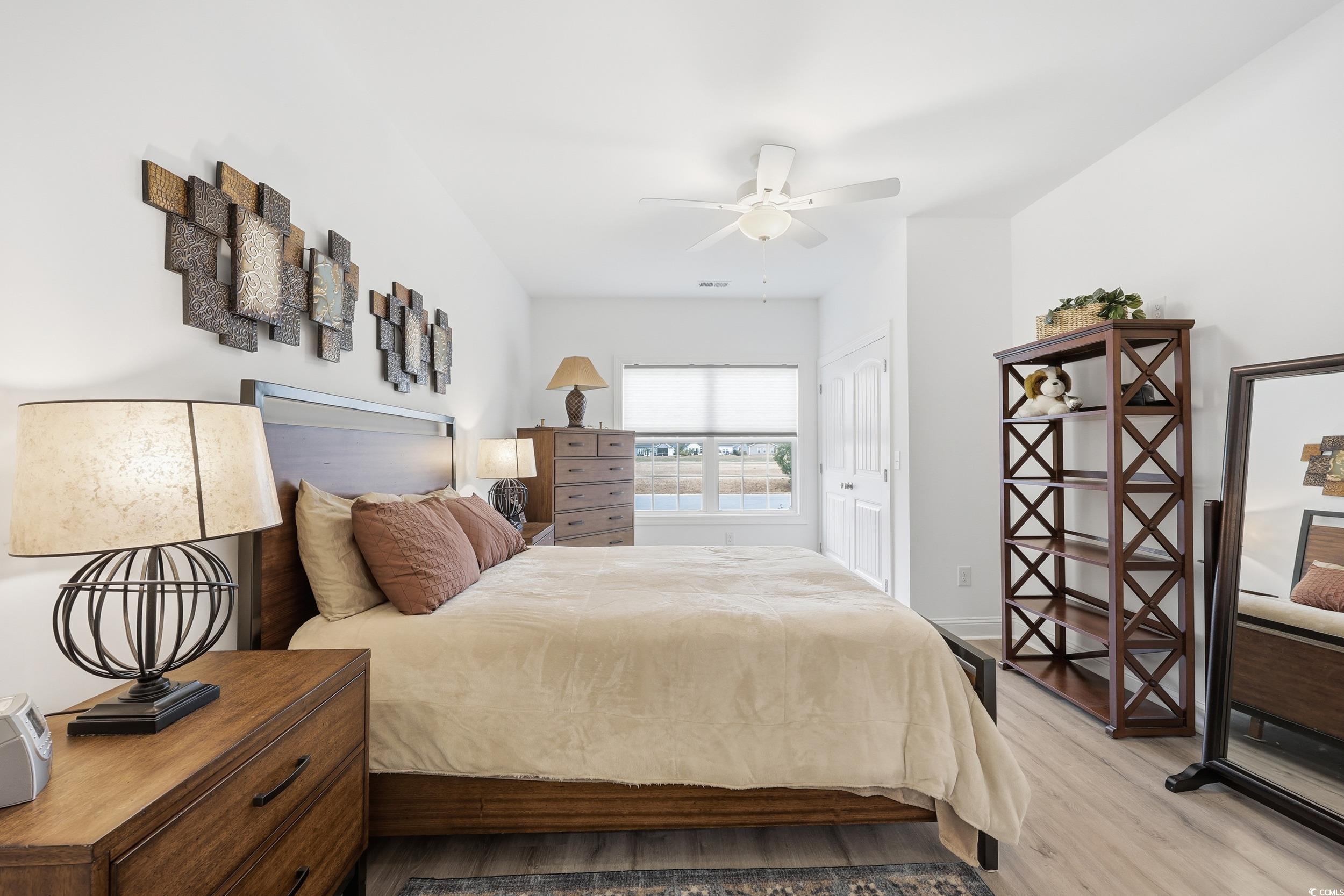 116 Kingsbury Loop, Unit C Conway, SC 29526 - Photo 11 of 32 Bedroom with a closet, lvp floors, and ceiling fan