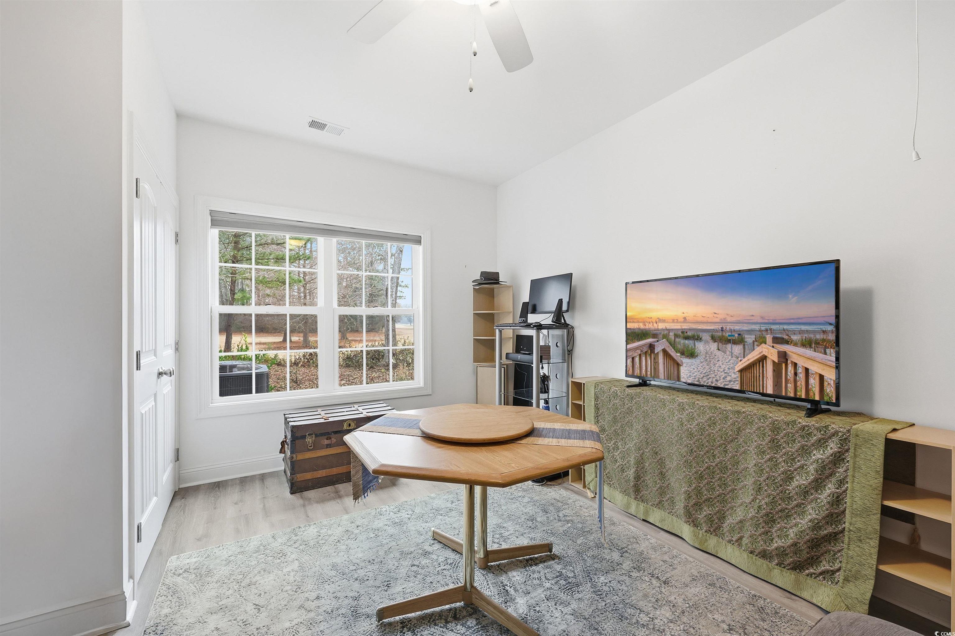 116 Kingsbury Loop, Unit C Conway, SC 29526 - Photo 17 of 32 Sitting room featuring lvp, a ceiling fan, and attic access. Some furniture has been digitally removed to better show the space. *Original photos included