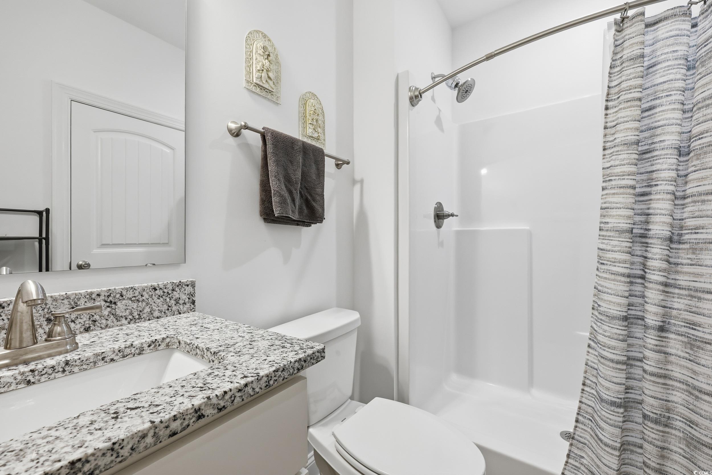 116 Kingsbury Loop, Unit C Conway, SC 29526 - Photo 19 of 32 Full bathroom with a shower stall and vanity