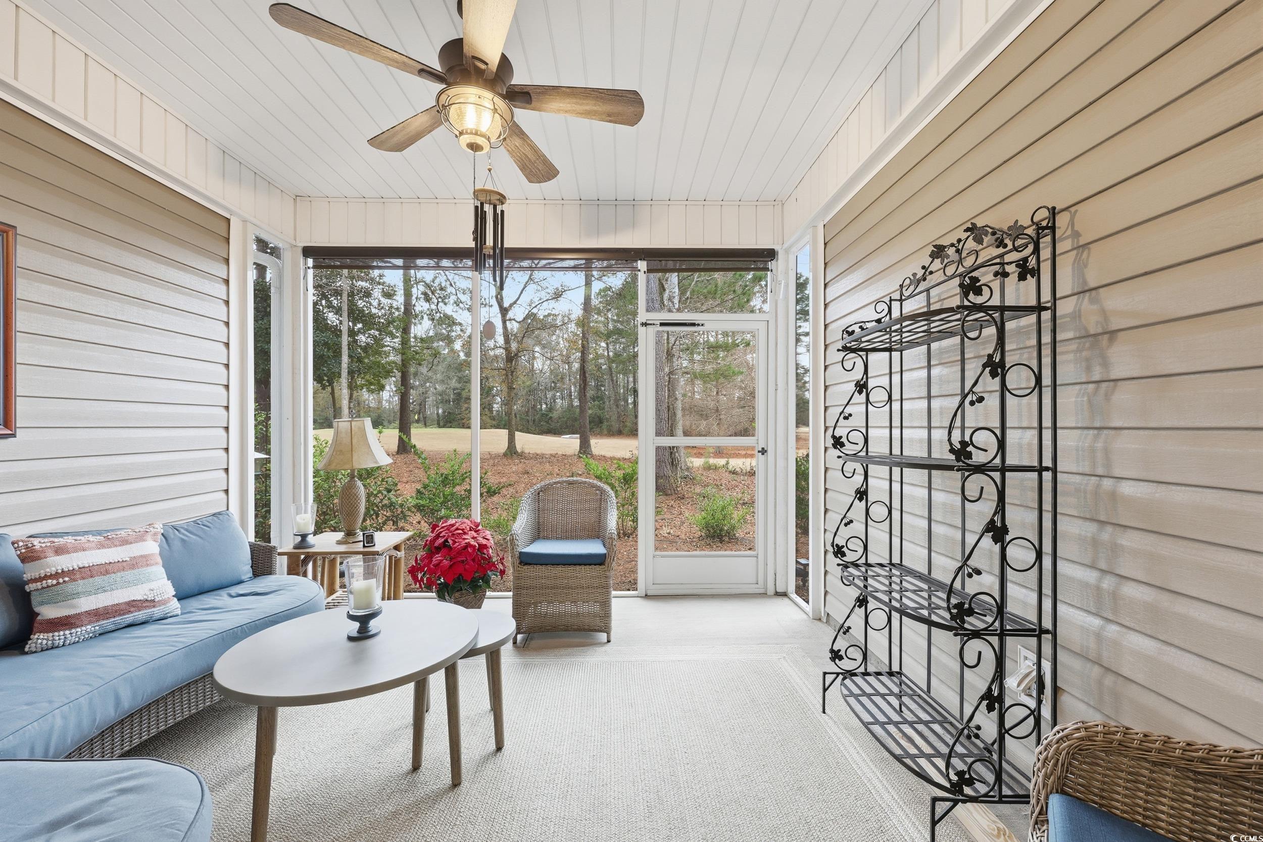 116 Kingsbury Loop, Unit C Conway, SC 29526 - Photo 20 of 32 Sunroom / solarium with ceiling fan and an outdoor hangout area