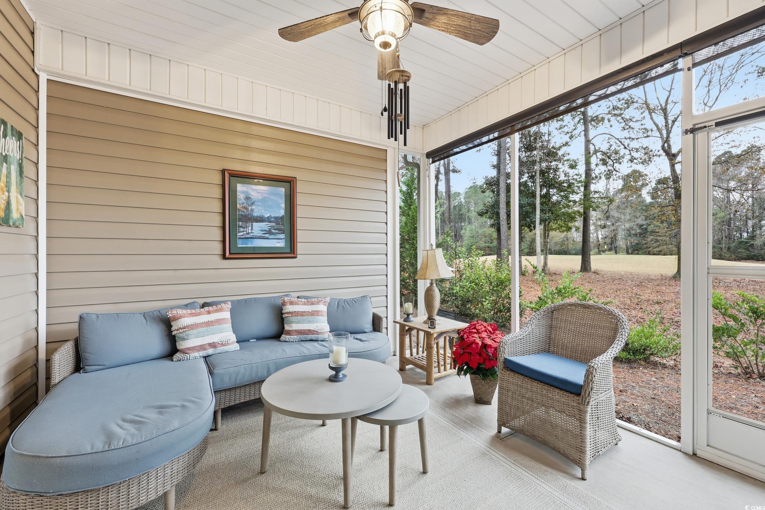 116 Kingsbury Loop, Unit C Conway, SC 29526 - Photo 21 of 32 Sunroom / solarium featuring an outdoor hangout area and a ceiling fan