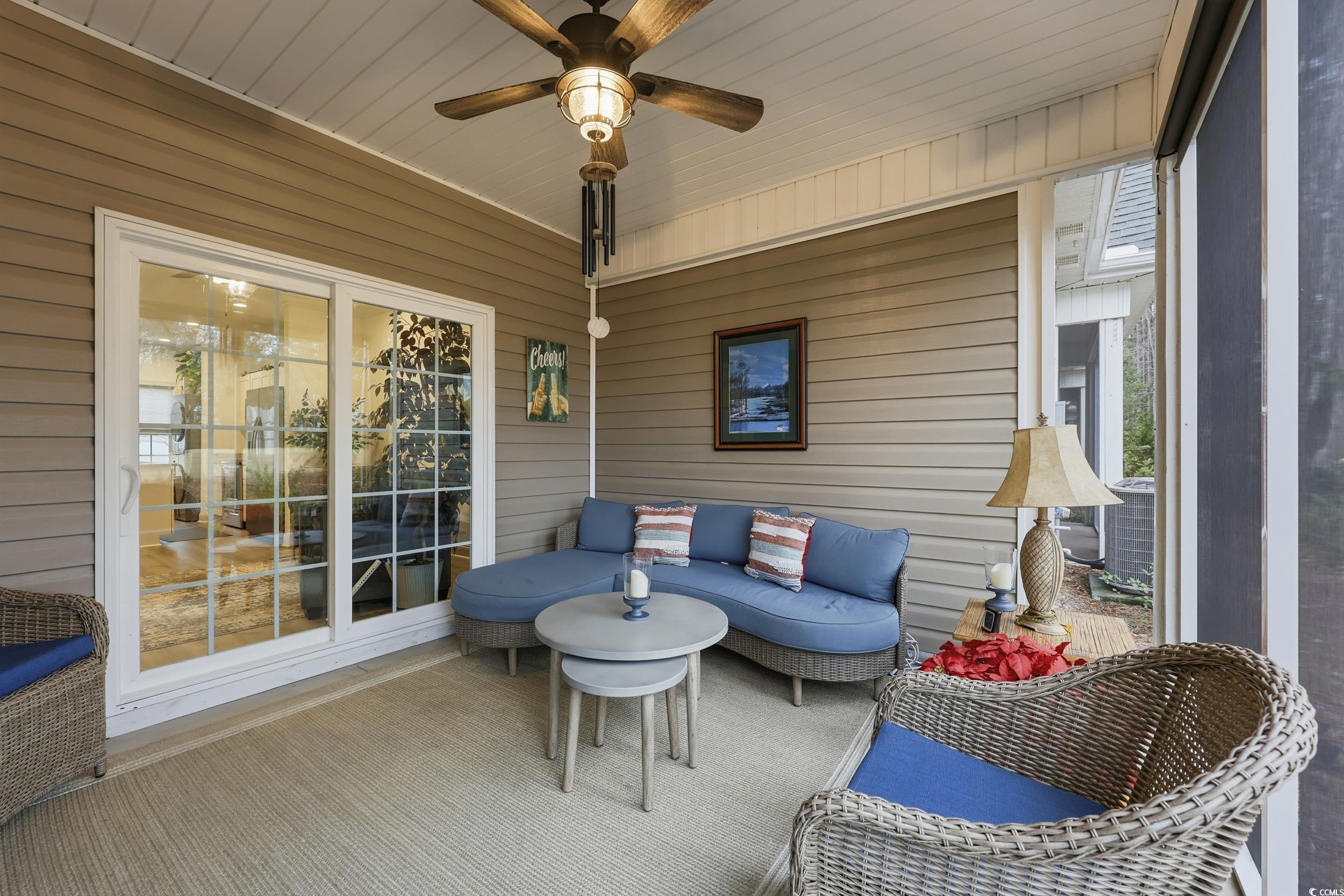 116 Kingsbury Loop, Unit C Conway, SC 29526 - Photo 22 of 32 Sunroom / solarium with an outdoor living space, ceiling fan, and a patio