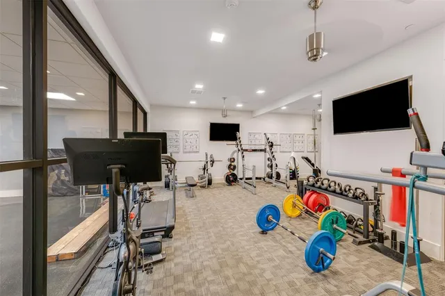 a view of a room with gym equipment