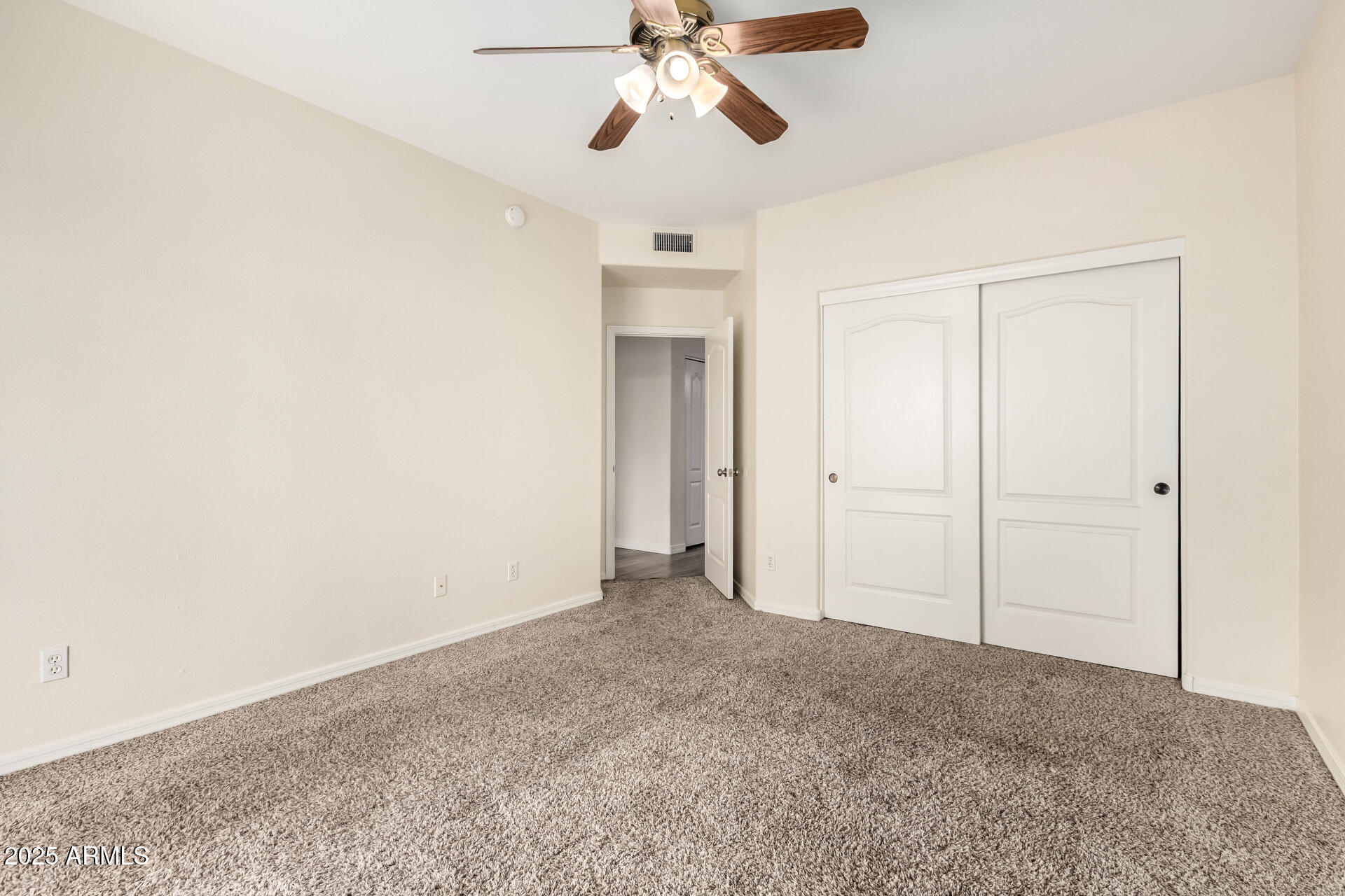 2201 North Comanche Drive, Unit 1104 Chandler, AZ 85224 - Photo 18 of 25 wooden floor in an empty room