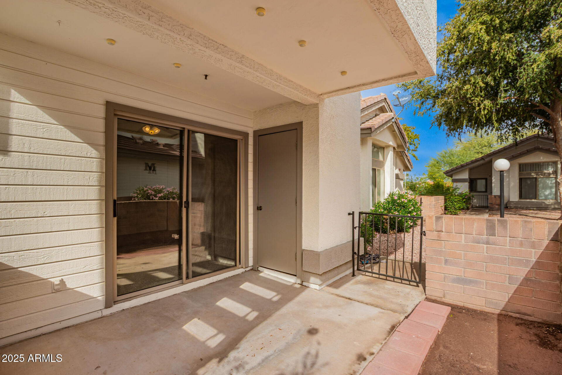 2201 North Comanche Drive, Unit 1104 Chandler, AZ 85224 - Photo 25 of 25 a view of a house with a patio
