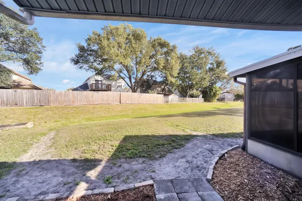 a view of an ocean and a yard