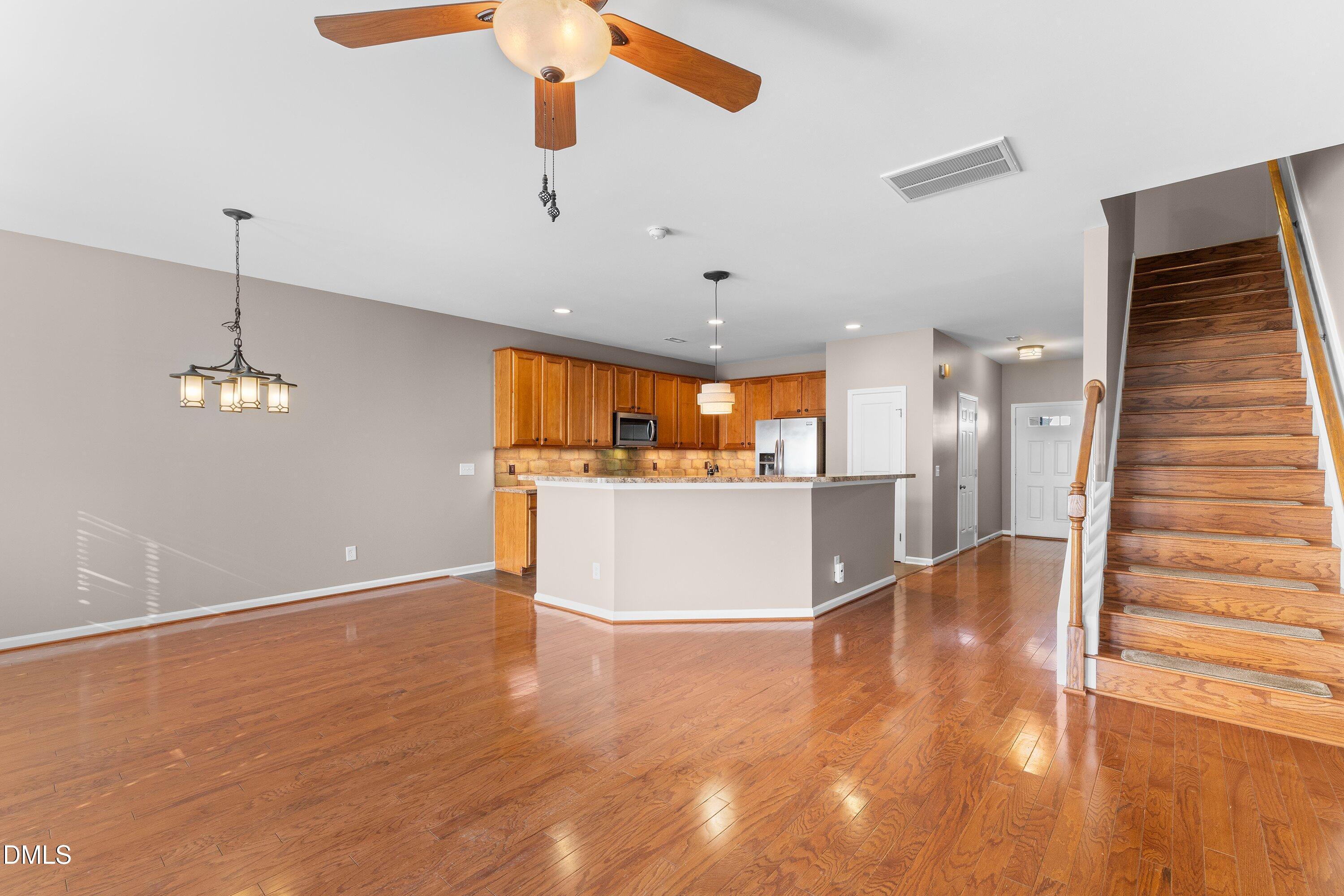 2639 Asher View Court Raleigh, NC 27606 - Photo 6 of 23 Dining Area and Family Room pic 2