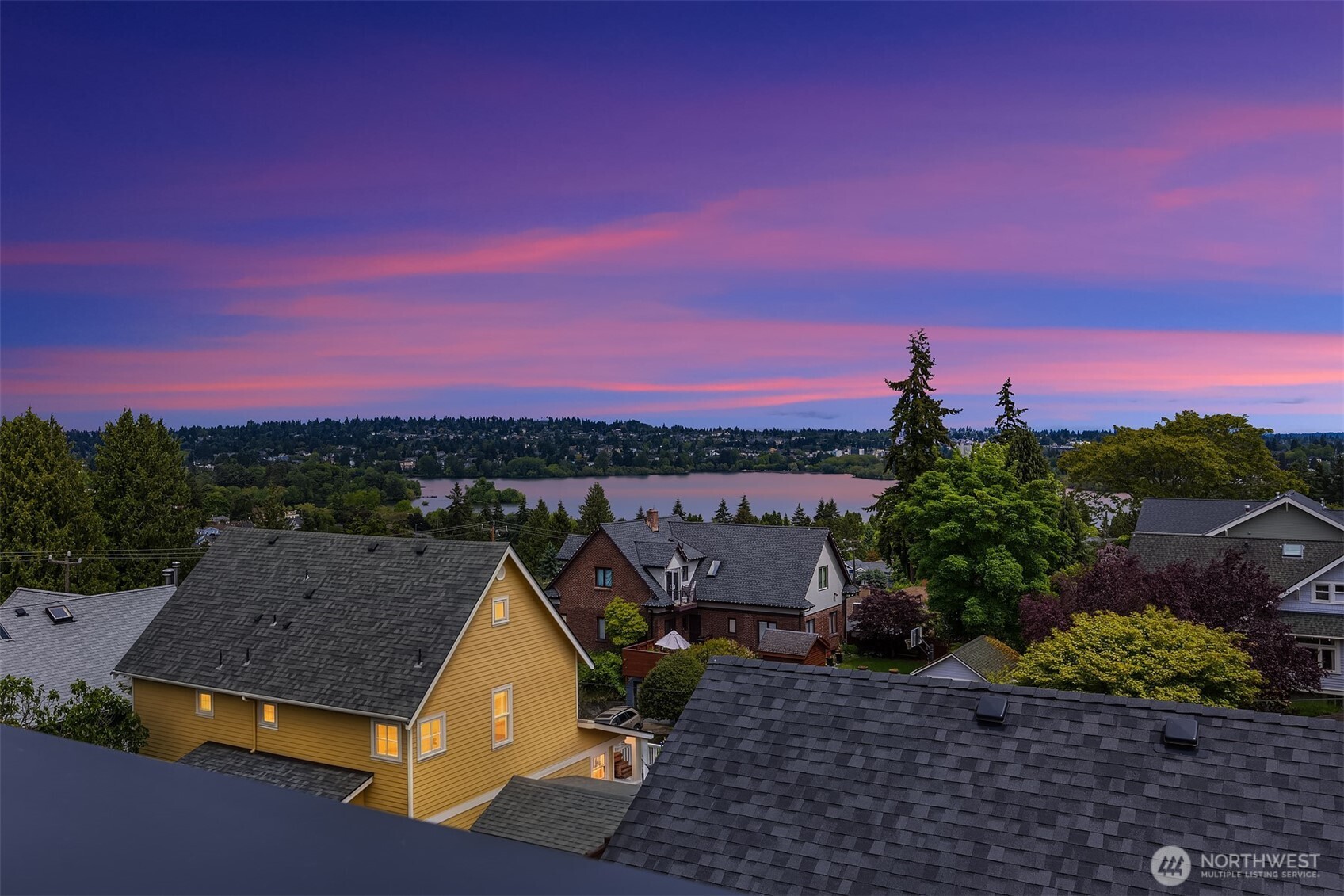 516 North 61st Street, Unit B Seattle, WA 98103 - Photo 1 of 17 a view of a terrace with a yard