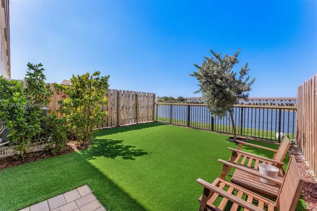 a view of a deck with a yard