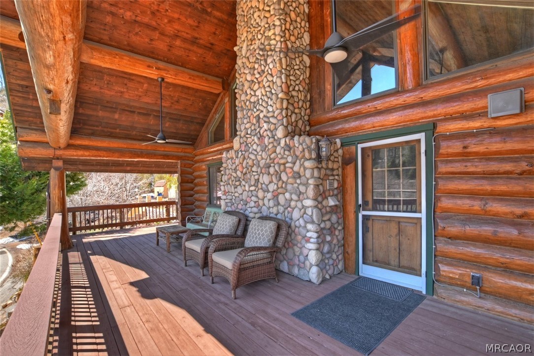 29632 Hook Creek Road Cedar Glen, CA 92321 - Photo 2 of 43 a balcony view with a seating space