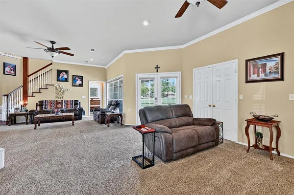 a living room with furniture and a couch