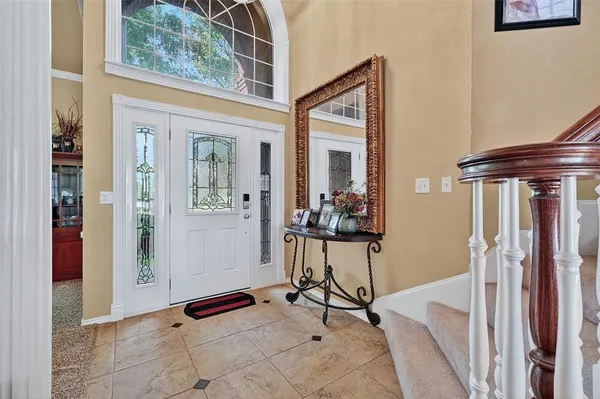 a view of balcony with furniture