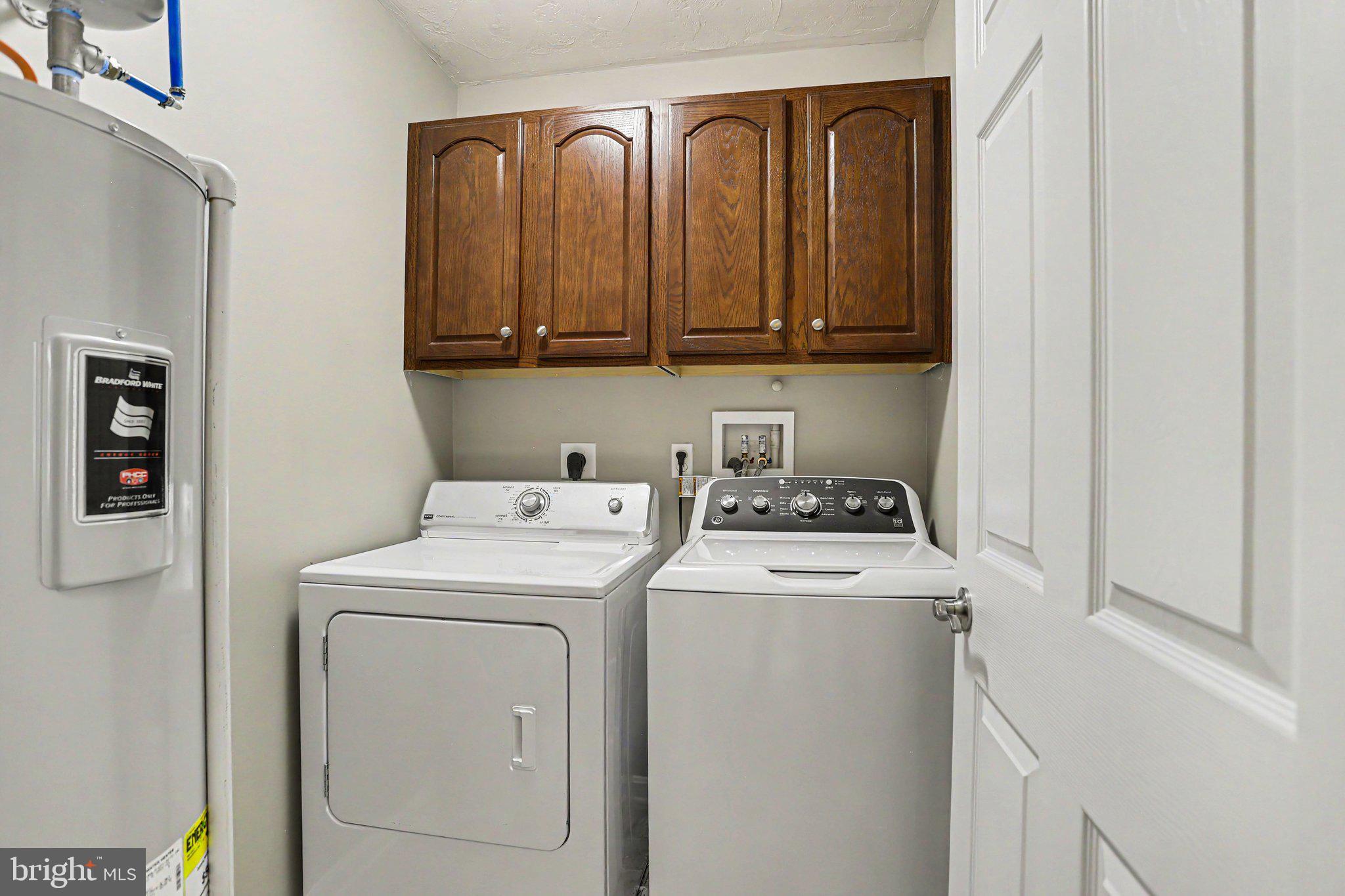1371 Chami Drive, Unit 166 Spring Grove, PA 17362 - Photo 24 of 28 a utility room with dryer and washer
