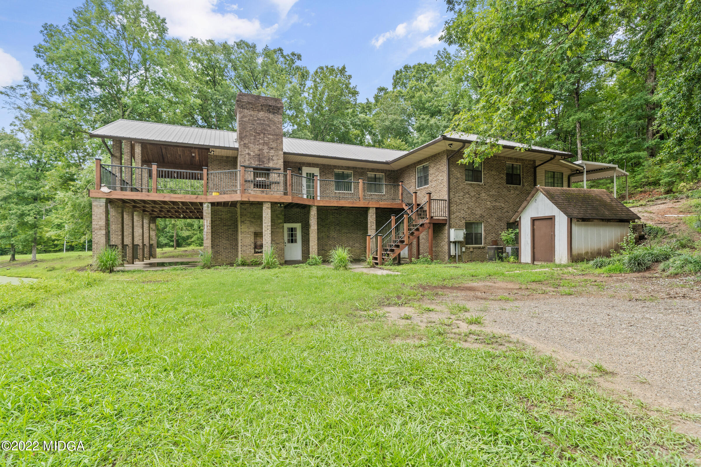 457 Lite-N-Tie Road Gray, GA 31032 - Photo 1 of 30 front view of a house with a yard
